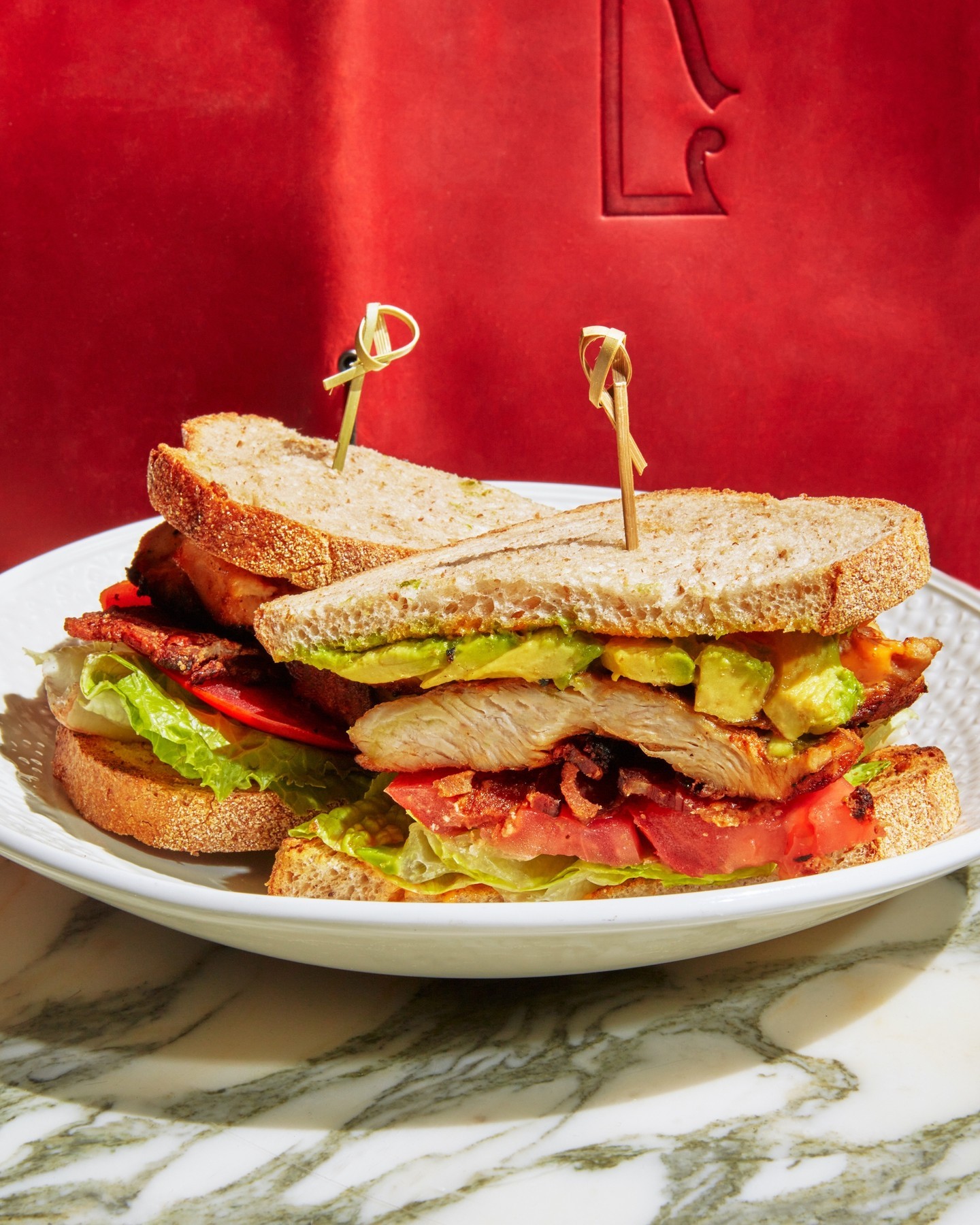 after a day of wandering through gorgeous Central Park, refuel with a picture-perfect Chicken Club Sandwich on Rose Lane's patio. roasted chicken, avocado, bacon, lettuce, tomato, chipotle mayo – what more could you need?⁠⁠photo: @emmafishman